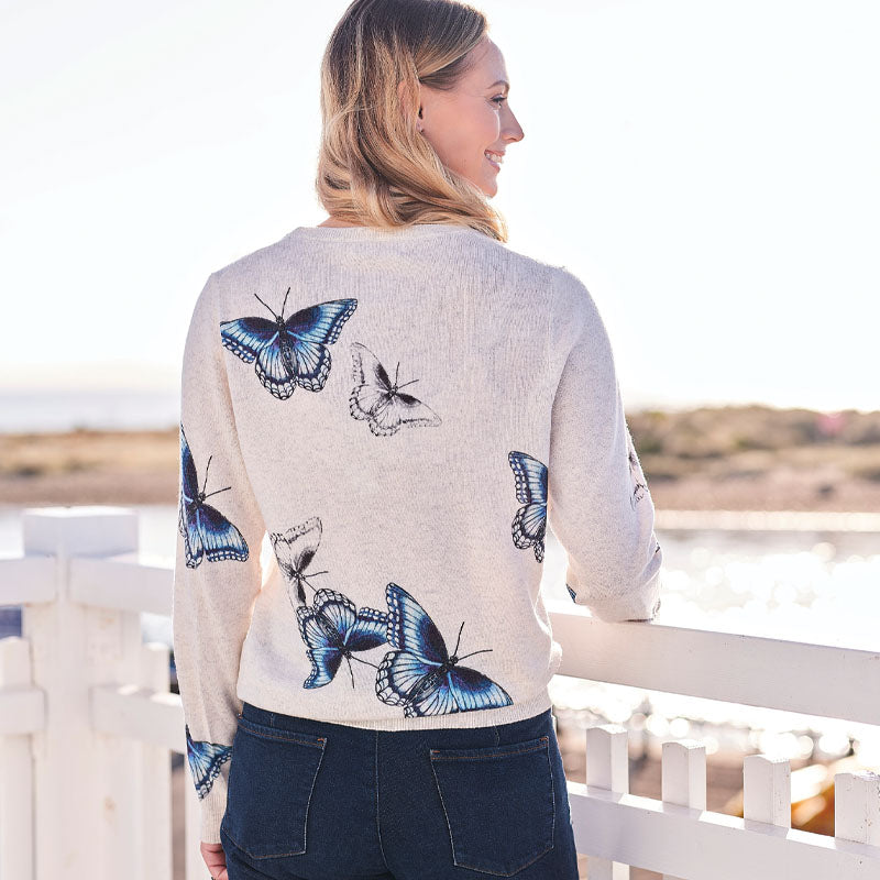 women wearing and butterfly printed cashmere sweater 