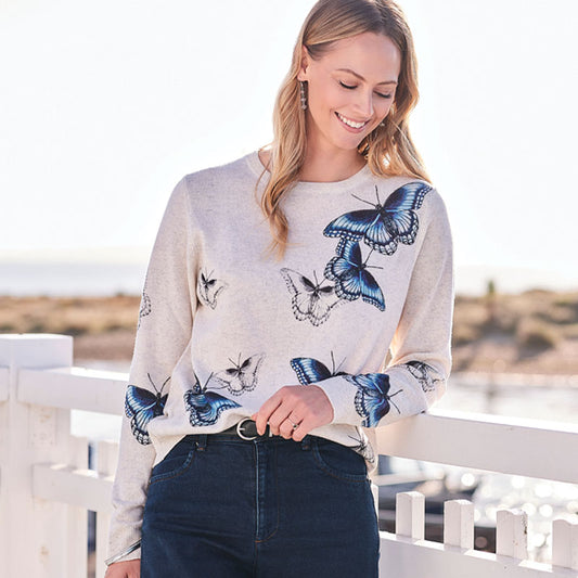women wearing and butterfly printed cashmere sweater 